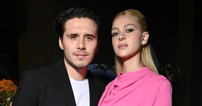 Brooklyn Beckham and Nicola Peltz exchanging vows under a chuppah in Jewish ceremony