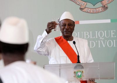 Guinea's ousted ex-president returns from medical trip