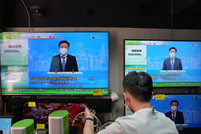 "A new symphony and I am the conductor," says HK leadership candidate