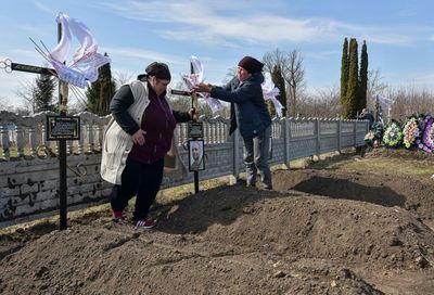 After Russians’ retreat, scarred Ukrainian village recounts month of terror