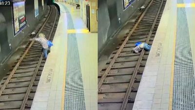 Video emerges of man falling onto tracks at Redfern station as response of staff, bystanders praised