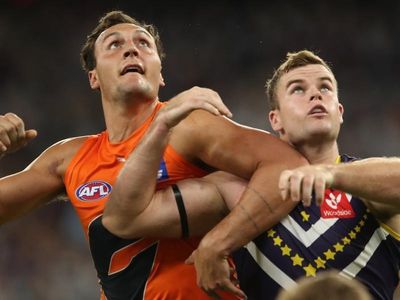 Dockers run riot late to sink Giants