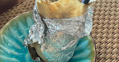 Woman's controversial method of eating a burrito branded 'criminal' in food debate