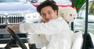 Brooklyn Beckham seen on his wedding day for the first time in monogrammed silk pjs