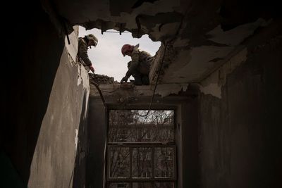 AP PHOTOS on Day 45: Aid reaches some traumatized Ukrainians