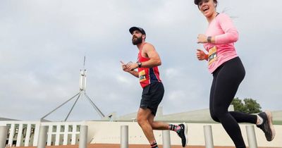 Canberra marathon winners celebrate as running festival draws huge crowd
