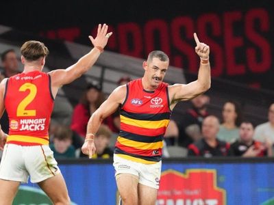 Bombers hold off Crows for first AFL win