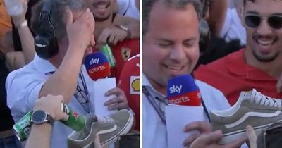 F1 pundit Ted Kravitz swigs beer from Celtic fan's shoe as he delights Australian GP crowd