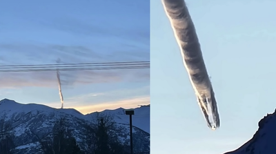 Worm-shaped cloud over Alaska mountain prompts police investigation amid fears it could be UFO or plane crash