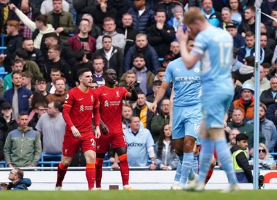 Manchester City retain Premier League lead after Liverpool draw