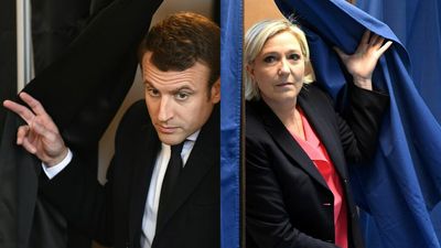 Macron, Le Pen head to 2nd round of French election, first projections show