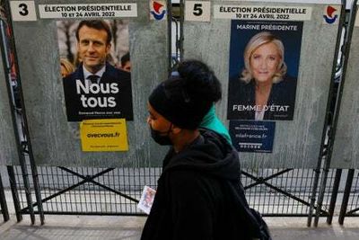 Macron leads Le Pen as runoff vote looms in French election