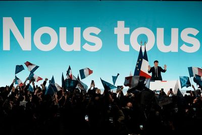 Beer flows, Champagne bubbles as Macron, Le Pen reach final