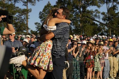 Scottie Scheffler and his wife celebrated his Masters win with a hug-filled walk that fans loved