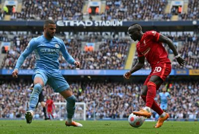 Man City retain title advantage after Liverpool draw