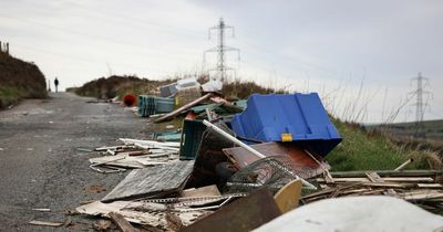 Pile of tyres and plastic boxes dumped in Greater Manchester beauty spot