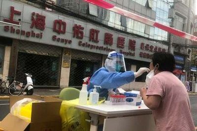 Shanghai starts to ease lockdown despite record 25,000-plus new Covid infections