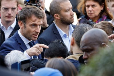 France's Macron begins battle to defeat Le Pen