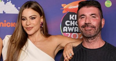 Simon Cowell looks unrecognisable as he poses at Kids' Choice Awards