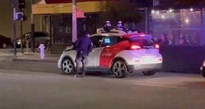 Bizarre video shows driverless car speed off after being pulled over by police