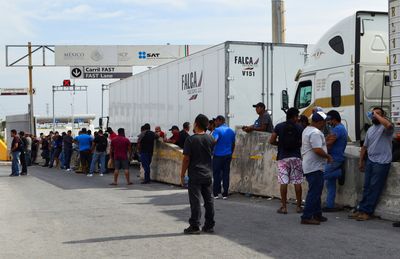Anger mounts along Texas-Mexico border over long delays to commercial crossings