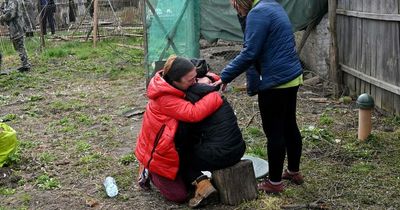 Heartbroken Ukrainian wife weeps over dead body of husband murdered by Russian soldiers