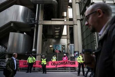 Extinction Rebellion force Lloyd’s of London to close headquarters after blocking entrance