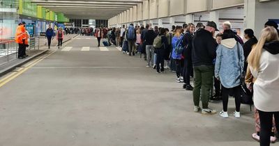 Manchester Airport passengers forced to queue in car park as travel chaos continues