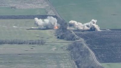 Running Scared: Russian Soldiers Flee On Foot From Missile Strike