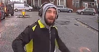 Police want to find this man after yob hurled stones at ambulance and stopped it going to emergency call