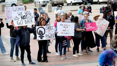 Oklahoma governor Kevin Stitt signs law criminalising abortion