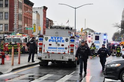 Suspect at large as Brooklyn subway shooting injures 16