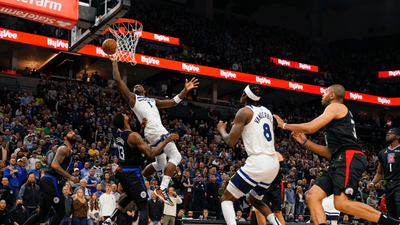 Fan Tries to Glue Herself to Court in Protest During Timberwolves-Clippers