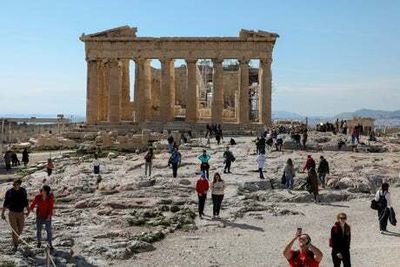 Greece lifts Covid restrictions for summer tourism season in boost for travellers