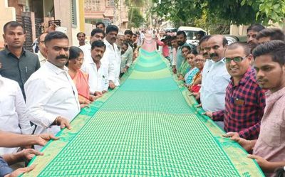Andhra Pradesh: Dharmavaram weaver creates Rama Koti on a silk cloth