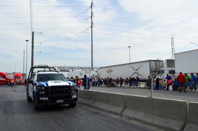 Trucker protest on US-Mexico border halts traffic for a third day