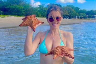 Elizabeth Hurley sparks outrage for holding starfish out of water