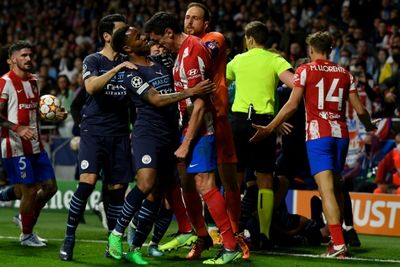 Stones praises City performance against 'hostile' Atletico as brawl mars tie