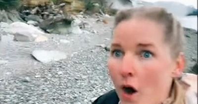 TikToker runs for life along beach from massive rockslide in terrifying footage