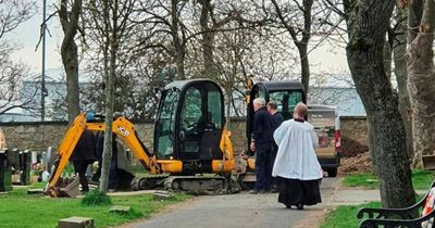 Woman's grave still being dug on day of funeral after digger scoop fell into hole