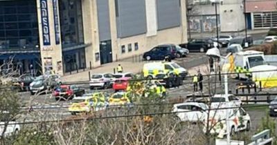 Edinburgh man in hospital after being hit by car as police rush to shopping centre