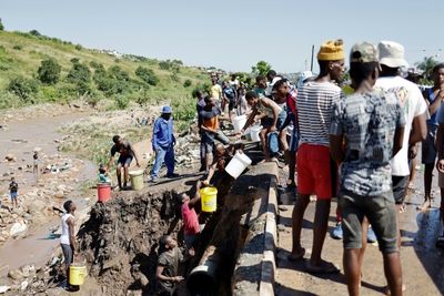 Without official aid, Durban flood victims dig themselves out