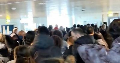 Man has 'never seen anything like it' as Manchester Airport Ryanair passengers wedged in terminal