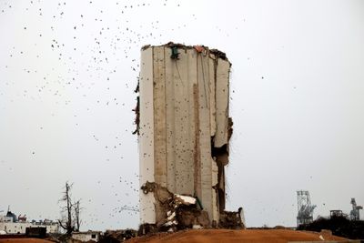 Lebanon to demolish blast-hit silos despite victims' protest