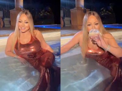 Mariah Carey celebrated the anniversary of her album by wearing a gown in her pool