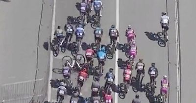 Cyclist smashes into barrier at high speed and goes flying in pile-up during sprint race