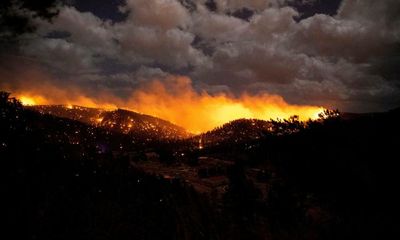 Couple found dead near their home as fire sweeps through New Mexico village