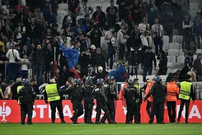 Lyon fans attempt to enter pitch after loss to West Ham in Europa League quarter-finals