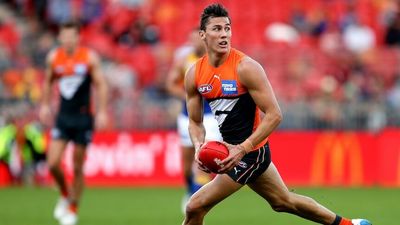GWS defender Isaac Cumming re-signs for two years after leaping into the AFL limelight