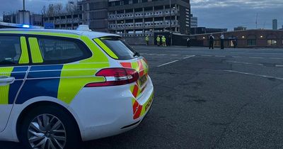 Man arrested after three hour standoff with police on station roof